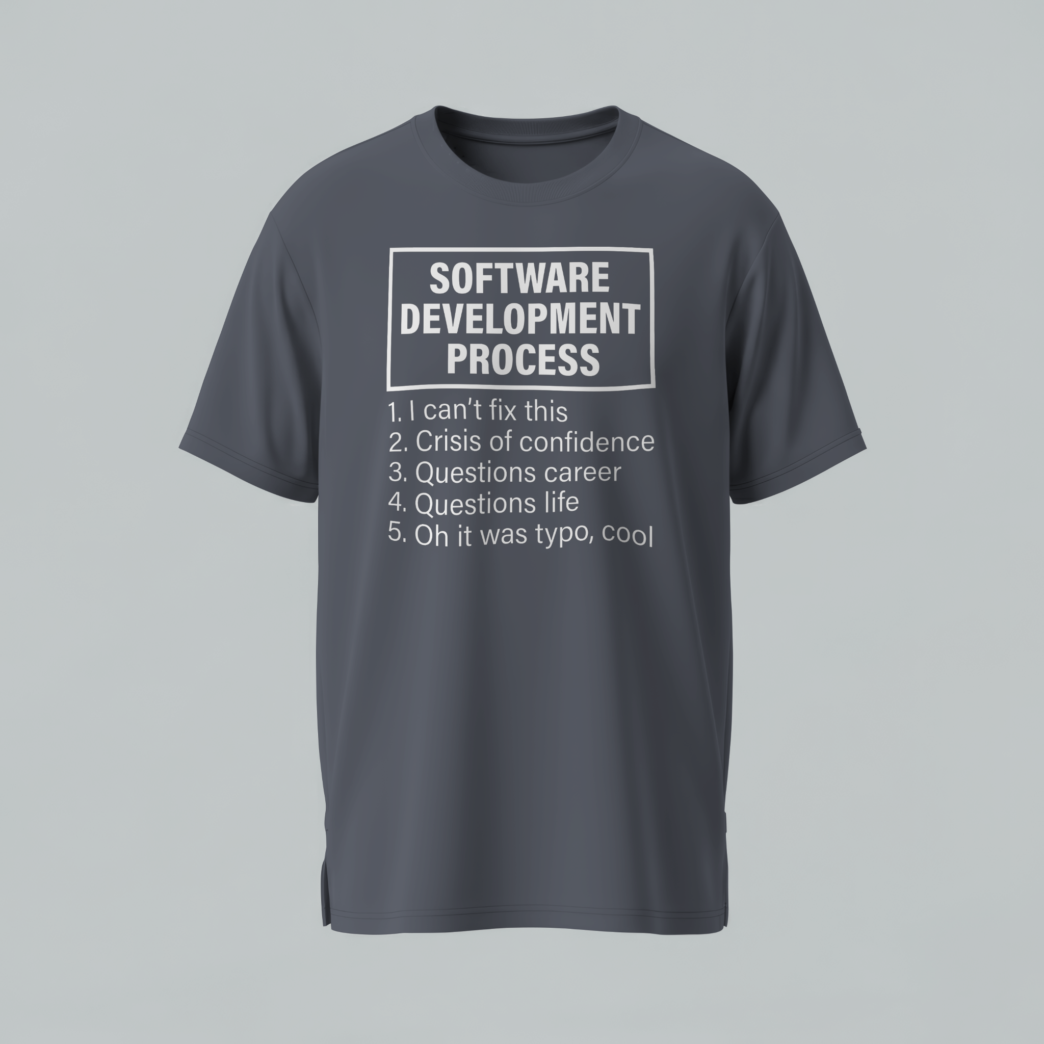 Gray t-shirt with humorous 'Software Development Process' text on a gray background