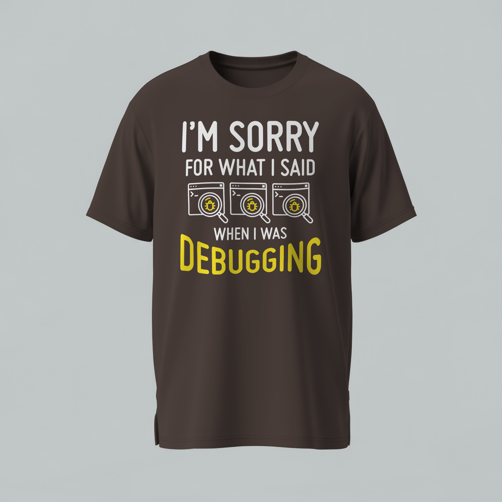 Brown t-shirt with text 'I'm sorry for what I said when I was debugging' on a gray background