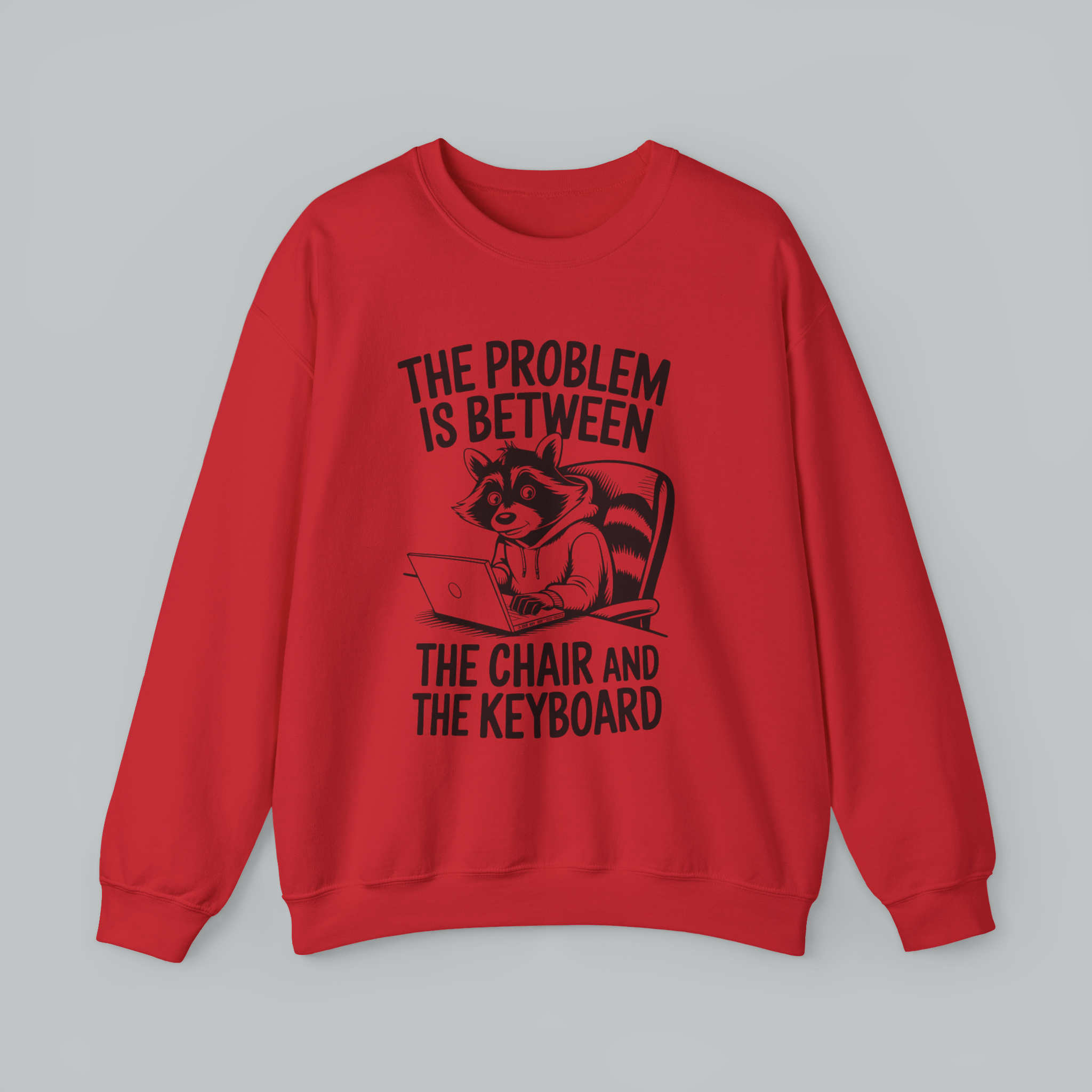 Red sweatshirt with a graphic of a raccoon and text on a gray background